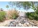 Beautiful rock feature in the backyard with potential for a water feature at 7138 W Sierra Vista W Dr, Glendale, AZ 85303