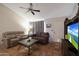Cozy living room featuring Saltillo tile and vaulted ceiling at 7138 W Sierra Vista W Dr, Glendale, AZ 85303