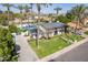 Sprawling property with a refreshing pool, lush lawn and tall palms at 726 W El Camino W Dr, Phoenix, AZ 85021