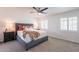 Inviting bedroom with a plush bed, natural light, and neutral decor at 726 W El Camino W Dr, Phoenix, AZ 85021
