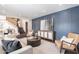 Stylish living room featuring an accent wall and modern decor at 726 W El Camino W Dr, Phoenix, AZ 85021