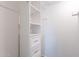 White walk-in closet with shelving and drawers at 726 W El Camino W Dr, Phoenix, AZ 85021