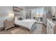 Main bedroom with luxury furnishings, neutral tones, and golf course views at 7400 E Gainey Club Dr # 123, Scottsdale, AZ 85258