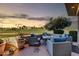 Outdoor patio with golf course views, comfortable seating and a cozy atmosphere at 7400 E Gainey Club Dr # 123, Scottsdale, AZ 85258