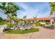 Community pond with fountains surrounded by lush landscaping and seating areas at 8401 N 84Th Pl, Scottsdale, AZ 85258