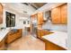 Beautiful kitchen with custom wood cabinets, marble countertops, and stainless steel appliances, perfect for culinary enthusiasts at 8401 N 84Th Pl, Scottsdale, AZ 85258