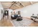 Inviting living room showcases vaulted ceilings, tiled floors, and seamless transition to the dining area at 8401 N 84Th Pl, Scottsdale, AZ 85258
