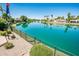 Beautiful view of the lake showcasing tranquil water views and lush landscaping from this lakeside property at 8401 N 84Th Pl, Scottsdale, AZ 85258