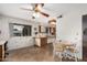 Eat-in kitchen with ceiling fan and large window allowing for natural light at 9202 N 107Th Ave, Sun City, AZ 85351