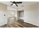 Bedroom with wood-look floors and closet shelving at 9306 E Fairbrook St, Mesa, AZ 85207
