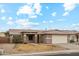 A beautiful front exterior view of a single-story home with desert landscaping at 9306 E Fairbrook St, Mesa, AZ 85207
