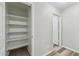 A look down the hallway shows a large, built-in storage closet to the left at 9306 E Fairbrook St, Mesa, AZ 85207