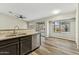 Modern kitchen featuring stainless steel appliances and granite countertops at 9306 E Fairbrook St, Mesa, AZ 85207