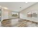 Bright living room with wood floors, large windows and natural light at 9306 E Fairbrook St, Mesa, AZ 85207