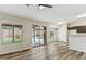 Open living room with backyard views through sliding glass doors at 9306 E Fairbrook St, Mesa, AZ 85207