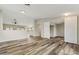 Bright open-concept living space with hardwood floors at 9306 E Fairbrook St, Mesa, AZ 85207