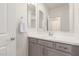 Well-lit bathroom with gray vanity and white countertop at 9544 E Theia Dr, Mesa, AZ 85212