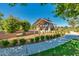 Charming community space featuring a covered ramada, playground equipment, and lush landscaping on a bright sunny day at 9544 E Theia Dr, Mesa, AZ 85212