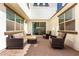 Charming courtyard features ample seating and serene setting for outdoor relaxation and entertainment at 9544 E Theia Dr, Mesa, AZ 85212