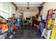 Functional garage space with ample storage, organization systems, and epoxy flooring at 9544 E Theia Dr, Mesa, AZ 85212