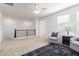 Open loft area features a cozy seating arrangement, plush carpet, and natural light at 9544 E Theia Dr, Mesa, AZ 85212