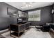 Office with a large desk, monitor setup and two black chairs at 9544 E Theia Dr, Mesa, AZ 85212