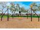 Unique swing set playground equipment, providing a fun and engaging play area within the residential community at 9544 E Theia Dr, Mesa, AZ 85212