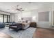 Well-appointed main bedroom featuring a sitting area, natural light, and stylish decor at 9834 E Voltaire Dr, Scottsdale, AZ 85260