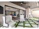 Relax in this beautiful outdoor living area, seamlessly connected to the interior through large sliding glass doors at 9834 E Voltaire Dr, Scottsdale, AZ 85260