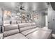 Enjoy this entertainment room with comfortable seating, ambient lighting, and a ceiling mounted projector at 9834 E Voltaire Dr, Scottsdale, AZ 85260
