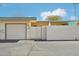 Street view of home featuring a garage and block wall at 9926 W Lancaster Dr, Sun City, AZ 85351