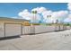 Street view of home featuring a garage and block wall at 9926 W Lancaster Dr, Sun City, AZ 85351