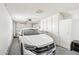 Well-lit garage with ample storage space and a clean, organized layout at 9926 W Lancaster Dr, Sun City, AZ 85351