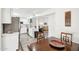 Open concept kitchen with dining area and view of living area at 9926 W Lancaster Dr, Sun City, AZ 85351