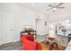 Bright living room features neutral walls, hardwood floors, and modern furnishings at 9926 W Lancaster Dr, Sun City, AZ 85351