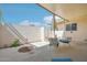 Enclosed patio area with shade covering and outdoor furniture at 9926 W Lancaster Dr, Sun City, AZ 85351