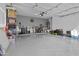 Spacious and well-organized garage with ample storage and clean epoxy flooring at 1049 S Exeter St, Chandler, AZ 85286