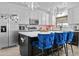 Modern kitchen with a large island and stainless steel appliances at 1049 S Exeter St, Chandler, AZ 85286