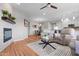 Open living space with fireplace, dining area, and modern kitchen in view at 11500 E Cochise Dr # 1094, Scottsdale, AZ 85259