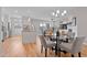 Open-concept living space with hardwood floors and ample natural light at 11500 E Cochise Dr # 1094, Scottsdale, AZ 85259