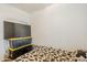 Bedroom with a bed, natural light, and pet kennels at 1189 E Tyler Ln, Casa Grande, AZ 85122