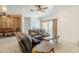 An open-concept living room showing furniture and connecting spaces at 1189 E Tyler Ln, Casa Grande, AZ 85122