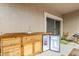 An outdoor kitchen boasts a sink, mini-fridge, and seating area at 1189 E Tyler Ln, Casa Grande, AZ 85122