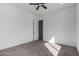 Comfortable bedroom showcasing neutral-toned walls, recessed lighting, and plush carpet at 14902 W Oberlin Way, Surprise, AZ 85387