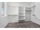 Walk-in closet with custom shelving and ample storage space for organization at 14902 W Oberlin Way, Surprise, AZ 85387