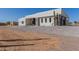 Contemporary home featuring clean lines, desert landscaping, and striking curb appeal at 14902 W Oberlin Way, Surprise, AZ 85387