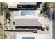 Overhead view of the property showcasing a house with solar panels, a patio and desert landscaping at 1559 E Peregrine Trl, Casa Grande, AZ 85122