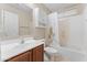 Bathroom featuring a single sink vanity, mirror and toilet at 1559 E Peregrine Trl, Casa Grande, AZ 85122