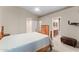 Comfortable main bedroom with ceiling fan, ensuite bathroom, and plenty of storage at 1559 E Peregrine Trl, Casa Grande, AZ 85122
