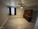Cozy bedroom showcasing a ceiling fan, and generous space, with ample natural light at 17406 N 28Th Dr, Phoenix, AZ 85053